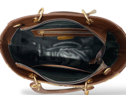 Bolso Tipo kelly mod. Viena Pitón Coñac